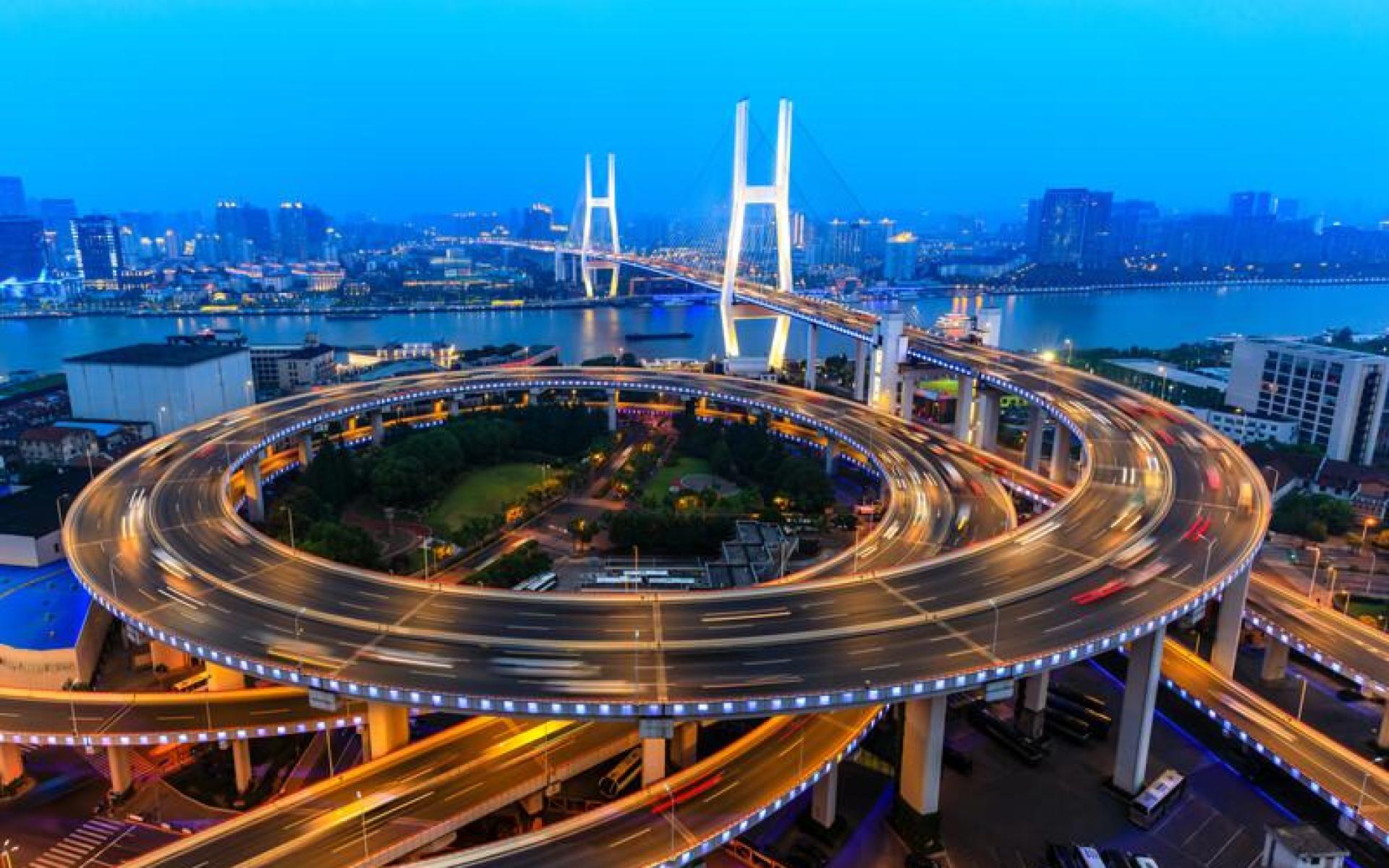 Liquified natural gas tanker on the water at sunset